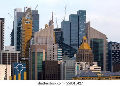 Singapore Modern Office Buildings Skyscrapers With Construction Cranes