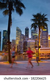 Singapore Night Life, People Jogging In Downtown 