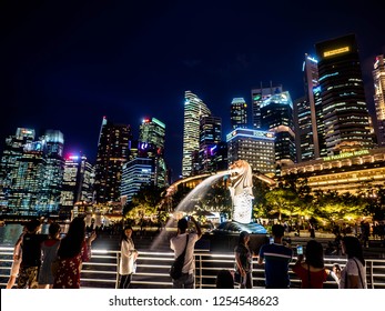 SINGAPORE - NOV 22, 2018: View Of The Business District And The Merlion Is The National Personification Of Singapore. The Merlion Was First Used In Singapore As The Logo For The Tourism Board.