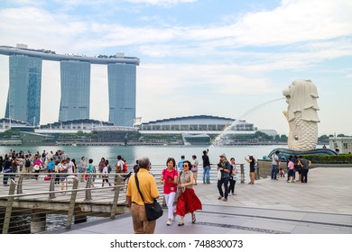 Singapore - November 1,2017 : The Merlion Fountain In Front Of Marina Bay Sand Hotel At Merlion Park. The Famous Tourist Attraction In Singapore.