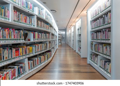 Singapore - November 18, 2020 : Modern interior of the Library Orchard with bookshelves in Singapore.