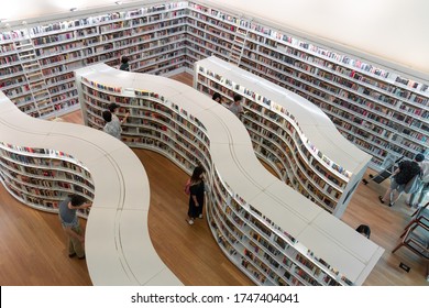 Singapore - November 18, 2020 : Modern interior of the Library Orchard with bookshelves in Singapore.