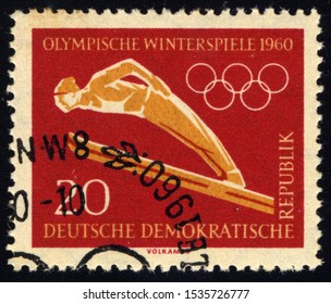 SINGAPORE - OCTOBER 18, 2019: A Stamp Printed In German Democratic Republic Shows Ski Jumping, Winter Olympics 1960, Circa 1960.