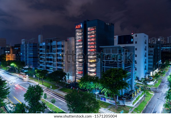 Singapore - October 2019: Autobahn Motors car vending\
machine at night.\
Autobahn Motors is a used car dealership in\
Singapore. 