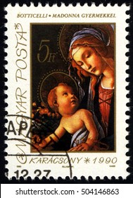 SINGAPORE â?? OCTOBER 25, 2016: A Stamp Printed In Hungary Shows Madonna And Child, Circa 1990