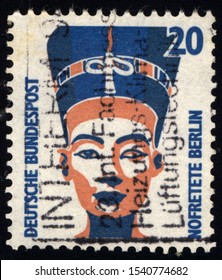 SINGAPORE - OCTOBER 25, 2019: A Stamp Printed In Germany Shows Queen Neferneferuaten Nefertiti Of Egypt, Bust, Egyptian Museum, Berlin, Circa 1987