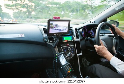 SINGAPORE, SINGAPORE - OCTOBER 5, 2018: Inside a taxi car driving around in Singapore.