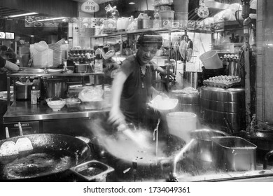 Singapore - September 07, 2019: Smiling Street Hawker Vendor Of Chinese Stall In Lau Pa Sat, Telok Ayer Market Hawker Center, Black And White