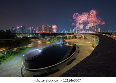 Singapore - September 16, 2018 : Night View Of Singapore City With Fireworks Of Singapore Formula One Race At  Marina Barrage Park.