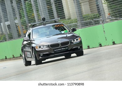 SINGAPORE - SEPTEMBER 22: BMW 3 Series Course Car At 2012 GP2 Race At Singapore Marina Bay Circuit On September 22, 2012 In Singapore