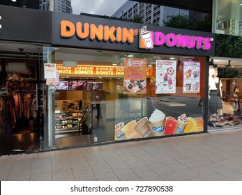 SINGAPORE - SEPTEMBER 26, 2017: Dunkin Donuts at Singapore Changi Airport. Changi Airport is one of the largest transportation hubs in Southeast Asia.