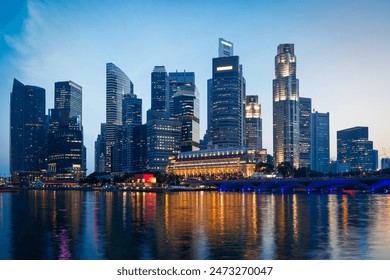 Singapore skyline and Marina Bay in evening - Powered by Shutterstock