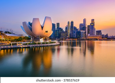 Singapore skyline at the Marina during twilight. - Shutterstock ID 378537619