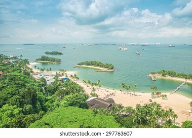 Singapore Travel - Aerial View Of Beach In Sentosa Island, Singapore.Singapore Is A Global Commerce, Finance And Transport Hub. Singapore Destination.