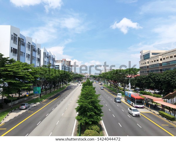 SINGAPORE:14 May 2019 - Street view with two way\
traffic around Kaki Bukit Industrial Park from overhead pedestrian\
bridges near Eunos\
Link