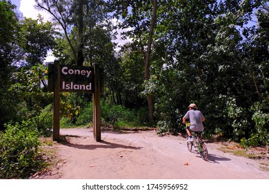Singapore2020 Lone cyclist riding in Coney Island Punggol. During extended Circuit Breaker period, the park may be closed to allow for safe social distancing; Coronavirus covid-19.