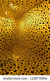 Singapore-August 13,2017:  An  Infinity Mirror Room Full Yellow And Black Poka Dots Installation Arts By Japanese Artist ,Yayoi Kusama.