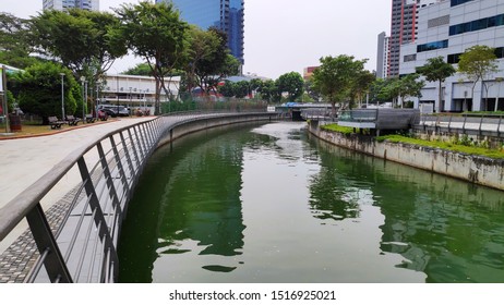 Singapore-Sep 22, 2019: Kallang Basin With Greenery And Some Buildings In The Background.