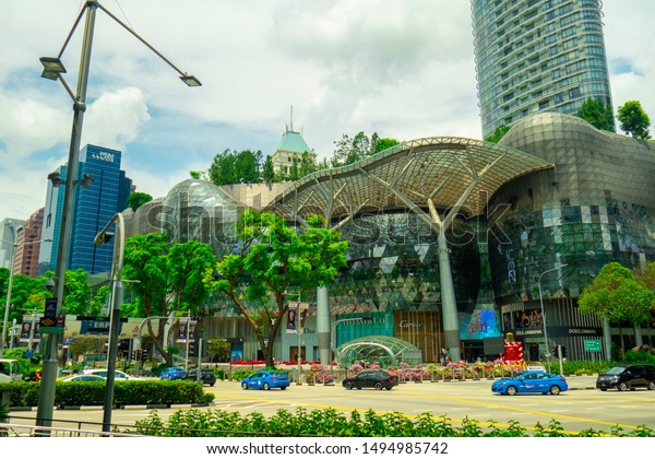 Singapore,September 2019;View at Orchard Road around\
with building ,shopping mall ,many tree and car on the road.\
Orchard road is the famous place in singapore city for shopping and\
sightseeing. \
\
