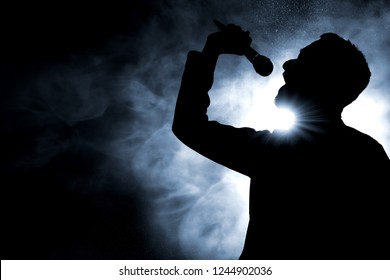 Singer singing silhouette
