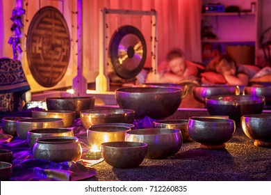 Singing Bowls Lit By Candlelight