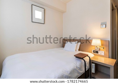 Single bed in modern small bedroom at apartment