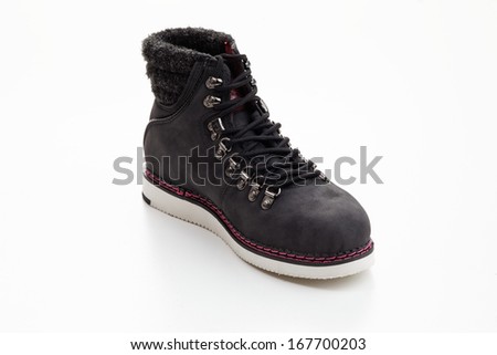 Single black boot isolated over white background. Clipping path included.No brand Stock photo © 