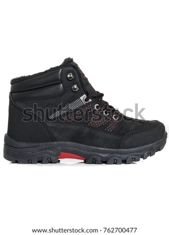 Single black boot isolated over white background. Clipping path included. Stock photo © 