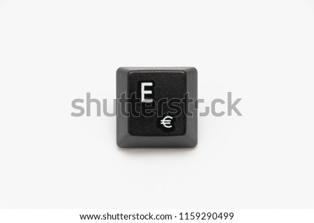 Single black keys of keyboard with different letters