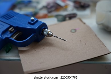 A Single Blue Isolated School Children Supply That Are Used By Small Children In Classes On Handmade Arts Laying On A Thick Paper Plate In A Workplace