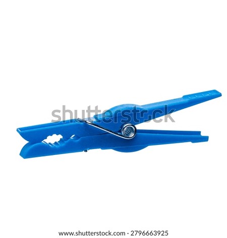 Single blue plastic clothes peg or pin isolated on a clean white background