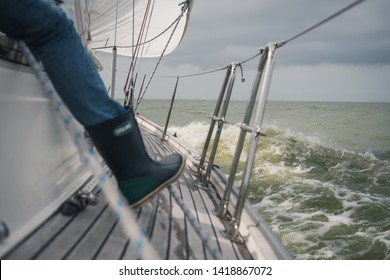 Single Boot In The Galley Of A Sailing Yacht Sailing Under Speed