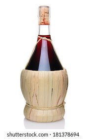 A Single Bottle Of Chianti Wine With A Wicker Basket Base. Vertical Format Isolated On White With Reflection.