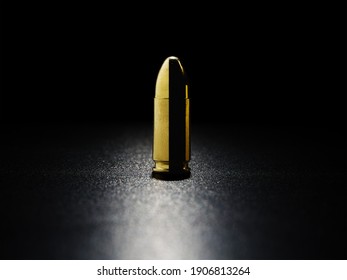 Single bullet 9mm luger dark background