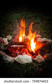 A Single Camp Fire With No People Around It