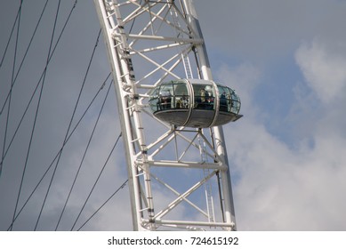 A Single Car Of The London Eye Against A Partly Cloudy Sky