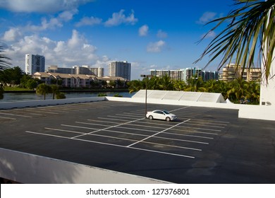 Single Car On A Parking Lot