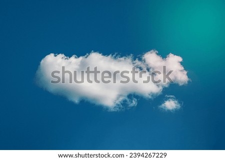 Single cloud in deep blue sky looks like whale in ocean, dream like cloudscape, daydreaming concept