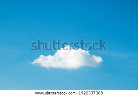 Single Cloud: Serene Beauty Against the Blue Sky