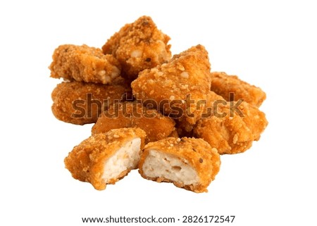 A Single Complete Serving Of Crispy Seasoned Chick Isolated On White Background