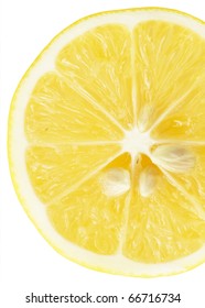 Single cross section of lemon. Isolated on white background. Close-up. Studio photography.
