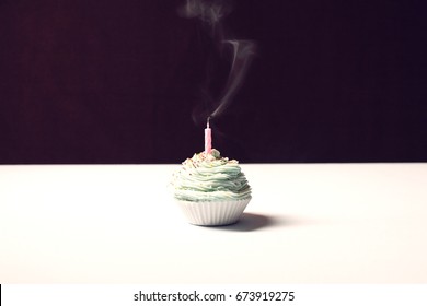 Single Cupcake With Blowed Birthday Candle