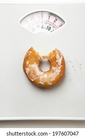 Single Donut Shot On Scale For Weighing Yourself