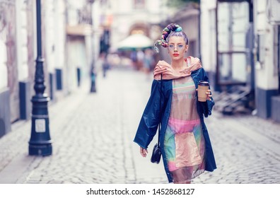 Single Edgy Girl With Extravagant Look On Streets. Crazy Appearance On Boulevard. Avant-garde Fashion Concept