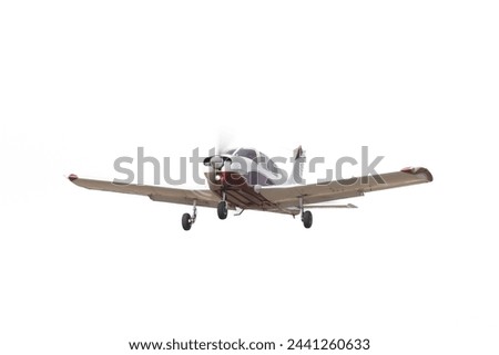 Single Engine Aircraft Isolated. Low wing general aviation, small plane single propellor. Fixed landing gear, takeoff aeroplane
