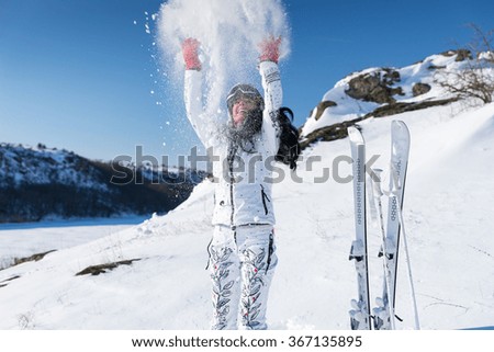 Similar – Skier from behind on the mountain