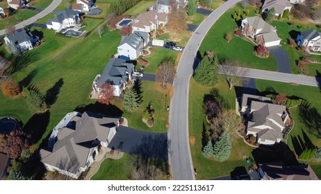 Single Family And Duplex Houses Along Large Residential Street With Grassy Lawn And Colorful Fall Foliage At Suburban Neighborhood In Rochester, New York. Upscale Suburban Home In Subdivision USA