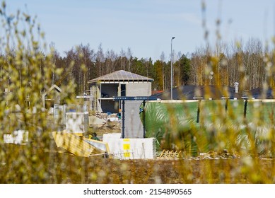 Single Family Home Construction. Interior Frame Of New Wooden House Under Construction. House Under Construction With The Roof Structure Of Wood. Construction Frame House Made Of Wood, With Roof