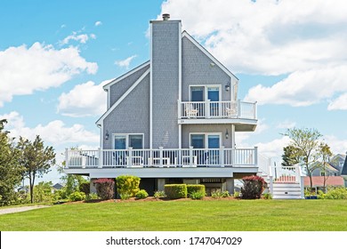 A Single Family Home In Fairhaven Massachusetts Is Built On Stilts In Case Of Flooding Due To Its Proximity To The Ocean.