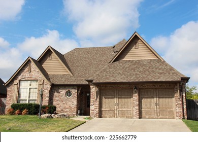 A Single Family Home Made From Brick And Stone